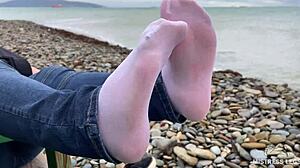 beautiful nylon feet in jeans teased outdoors close up