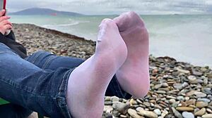 beautiful nylon feet in jeans teased outdoors close up