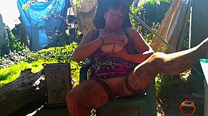 Klaudia Ambergirl enjoys a solo outdoor session in stockings.