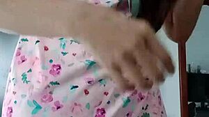 Model poses in sexy pink pajamas with innocent colleague