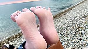 beautiful nylon feet in jeans teased outdoors close up