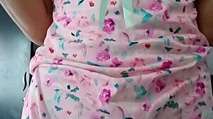 Model poses in sexy pink pajamas with innocent colleague