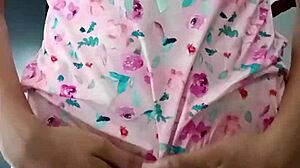 Model poses in sexy pink pajamas with innocent colleague