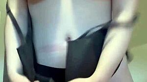 Young amateur with huge natural tits masturbates and cums on stuffed panties