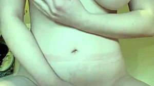 Young amateur with huge natural tits masturbates and cums on stuffed panties