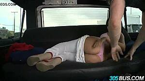 latina rides the 305 bus in public setting