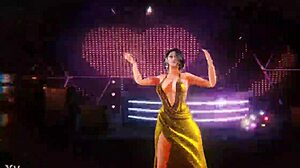 This beautiful woman is shaking her hips in an energetic dance performance