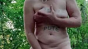 Bound Slave Flashes in Forest Humiliation