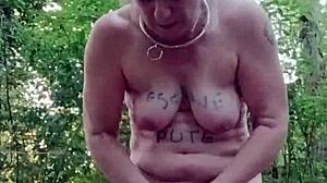 Bound Slave Flashes in Forest Humiliation