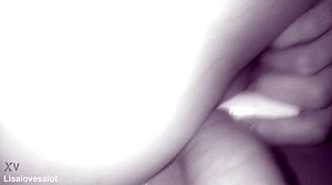 In the darkroom, lover inserts into pussy, penetrates ass, fists and punches cunt.