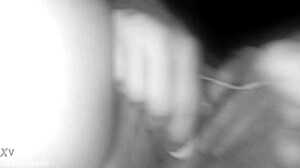 In the darkroom, lover inserts into pussy, penetrates ass, fists and punches cunt.