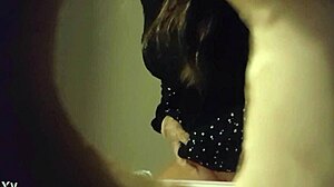 hidden cam captures sexy babe in white panties peeing in toilet through wall hole.