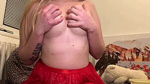 Blonde Girl In Red Outfit Showing Her Body And Feet Closely