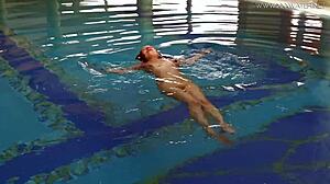 watch lina mercury, russian babe with big tits, in red lingerie underwater at the pool