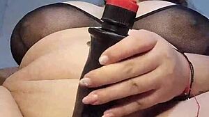 Curvy Latina BBW devours 9-inch dildo intensely.