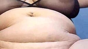 Curvy Latina BBW devours 9-inch dildo intensely.