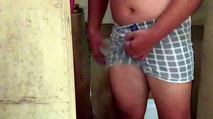 Man Receives Handjob On His Hard Cock Before Entering The Shower For Bathing