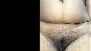 Indian step mom feels embarrassed pissing nude in bathroom