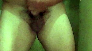 Man Receives Handjob On His Hard Cock Before Entering The Shower For Bathing