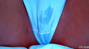 Sexy latin girl shows off her big round ass in a white thong under a blue dress