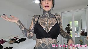 melody radford tries on black and purple lingerie