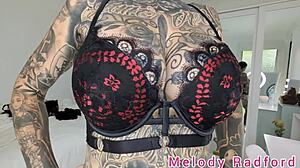 melody radford tries on black and purple lingerie