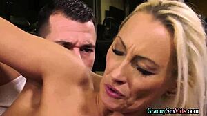 GYM GILF SUCKS TRAINERS COCK AFTER WORKOUT WITH FACIAL JIZZ!