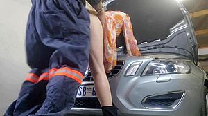 Amateur couple with shaved pussy babe bent over in miniskirt. Mechanic fucks wife doggystyle for creampie while husband watches as cuckold.