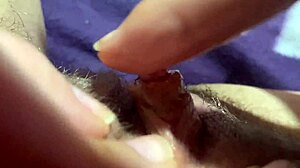 Watch huge clit rubbing lead to intense orgasm in closeup