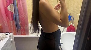 Spying on my stepsister with big tits in the bathroom?