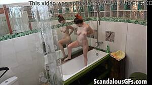 Redhead Girl Washing Shaved Pussy with Showerhead