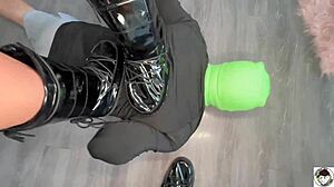 the brunette in boots kicks balls hard at boot camp