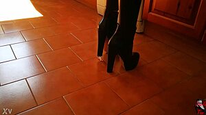 Intriguing Tall Mistress in Boots Dominates Slave in Garage