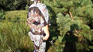 hairy mature woman flashes on nudist beach outdoors