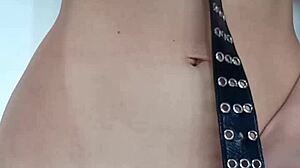 i'm punishing myself a little with a belt on my pussy and tits