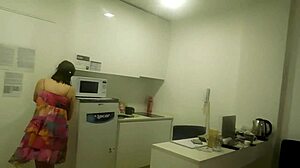 In this amateur video, a tattooed milf with big tits engages in a hot threesome featuring deepthroat blowjobs and doggystyle assfucking.