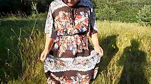 hairy mature woman flashes on nudist beach outdoors