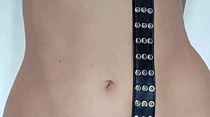 i'm punishing myself a little with a belt on my pussy and tits