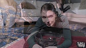 The blond slave girl degraded herself in the garage by bobbing for her dom's piss-soaked socks and puking on dildos from his ass