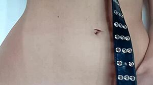 i'm punishing myself a little with a belt on my pussy and tits