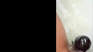 Latina Milf's Shaved Pussy Plays With Dildo