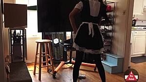 french maid subtly reveals upskirt while vacuuming in stockings