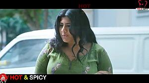 Swarnamalaya boldly shows off her massive big boobs in asian indian style.