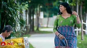 Swarnamalaya boldly shows off her massive big boobs in asian indian style.