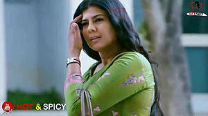 Swarnamalaya boldly shows off her massive big boobs in asian indian style.