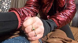 the nympho wife teases in her camel-toe jumpsuit. she adds cum to her shiny red down-jacket.