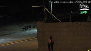 Amateur couple gets caught by beach security camera during outdoor public flashing with big tits voyeur action