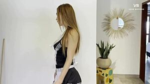 Naughty maid with athletic big ass and redhead long hair in homemade Latina roleplay drinks milk to the last drop in parody glamour.