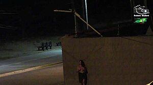 Amateur couple gets caught by beach security camera during outdoor public flashing with big tits voyeur action