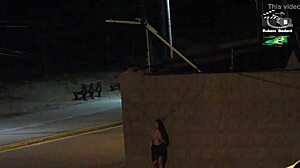 Amateur couple gets caught by beach security camera during outdoor public flashing with big tits voyeur action